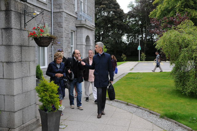 Seminar attendees arriving.
