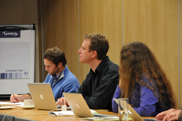 Seminar attendees watching presentation.