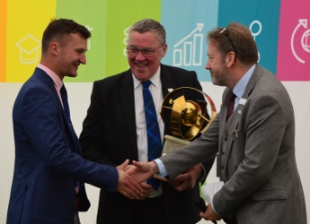 Alistair Brunton receives the Young Farmers Best Soil in Show 2019 award