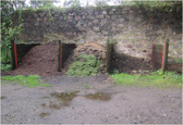 Composting on a large scale. The right hand bin is currently being used, the left hand one is nearly mature (and almost ready for use) while the centre bin is still being added to for later use once it is mature.