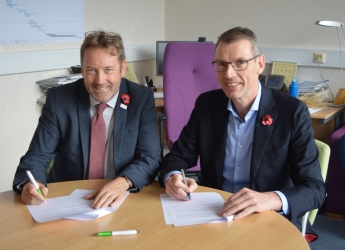 Prof Campbell and Mr Relaes signed the document
