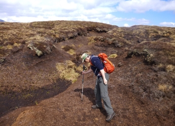 Erosion gullies in peat can be as deep as a person is tall