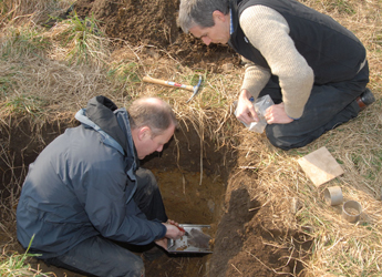 Image showing soil surveyors carrying out work in a soil profile pit