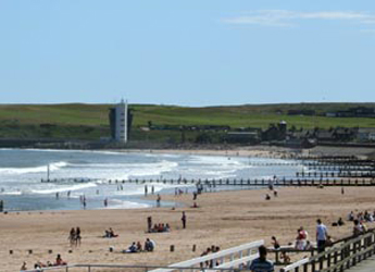 Photograph looking along Aberdeen beach