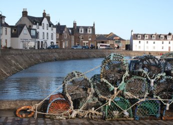 Photograph looking across the inner harbour at Stonehaven